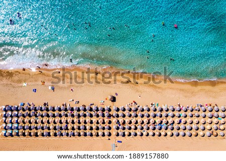 Aerial shot of beautiful turquoise beach Falasarna (Falassarna) in Crete, Greece. View of famous paradise sandy deep turquoise beach of Falasarna (Falassarna) in North West, Crete island, Greece. Royalty-Free Stock Photo #1889157880