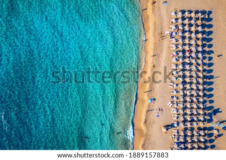 Aerial shot of beautiful turquoise beach Falasarna (Falassarna) in Crete, Greece. View of famous paradise sandy deep turquoise beach of Falasarna (Falassarna) in North West, Crete island, Greece. Royalty-Free Stock Photo #1889157883