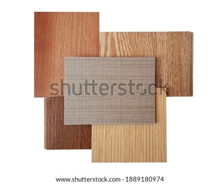 group of wooden laminated or veneer and engineer flooring samples from different types of wood for the designer's work. isolated on white background with clipping path (focused at center of image). Royalty-Free Stock Photo #1889180974