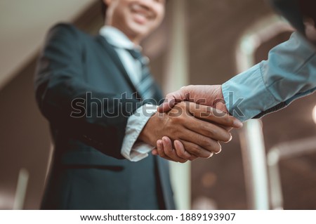 Businessman shake hands and get to know each other before they start talking about business.Bussiness,working, success concept  Royalty-Free Stock Photo #1889193907