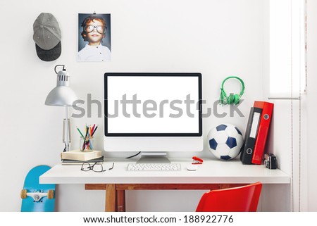Modern study room for a boy./ Desk in a child's bedroom. Royalty-Free Stock Photo #188922776