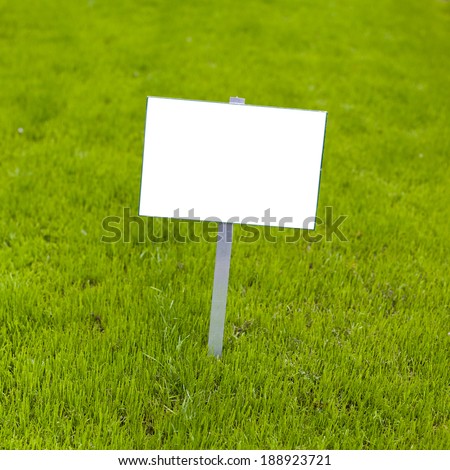 Sign on grass whith isolated space for caption