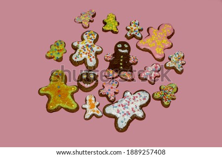 Festive gingerbread cookies decorated with sugar glaze