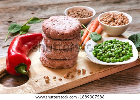 Veggie burger patties or plant based meat Royalty-Free Stock Photo #1889307586