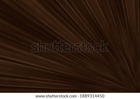 Dark brown wood marquetry in sunburst pattern