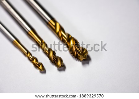 Tap for threading in metal on cnc machines. Tool for metal processing. Turning and milling machine.