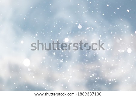 blue snowfall bokeh background, abstract snowflake background blurred abstract blue
