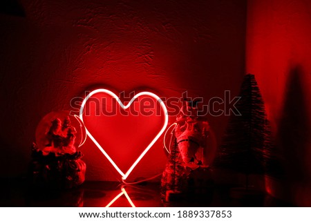 Neon sign red heart in the decor. Trendy style. Valentine day. Neon sign. Custom neon. Home decor.