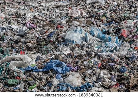 landfill for hazardous waste from household covid or cornavirus, dangerous waste dump Royalty-Free Stock Photo #1889340361