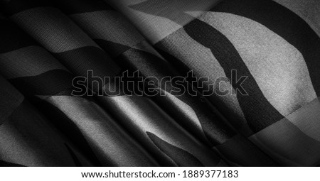 Texture. Pattern.pattern. silk fabric in abstract shades of black and white. silk texture, luxurious satin for abstraction, design and wallpaper, soft and blur style, smooth,