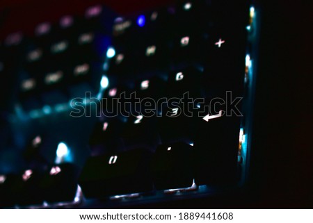 Computer keyboard with backlight in the dark