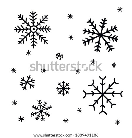 Snowflakes set of doodle. Winter elements in naive illustration style.
Hand drawn vector picture isolated on white.