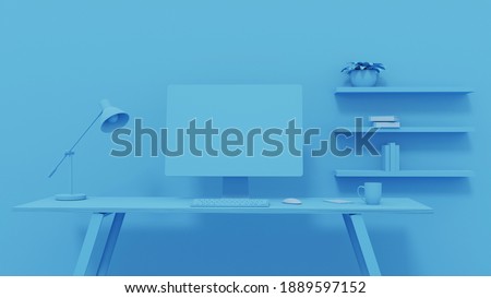 Empty Screen Computer on Desk Blue Background Royalty-Free Stock Photo #1889597152