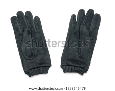 A pair of black suede gloves isolated on a white background. Men's accessory for cool weather.