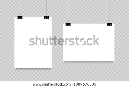 Blank poster hanging on clips. A4 paper page In landscape and portrait formats. Realistic white paper sheet. Mockup poster for design.