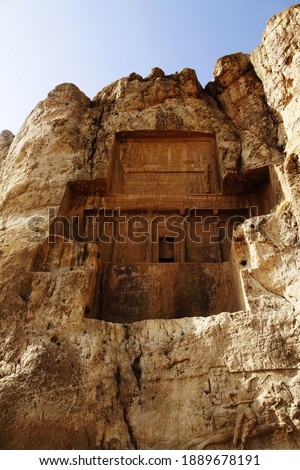 Naqsh-e Rostam is an ancient necropolis located about 12 km northwest of Persepolis, in Fars Province, Iran, with a group of ancient Iranian rock reliefs cut into the cliff