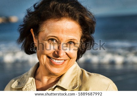Photo of senior woman on beach