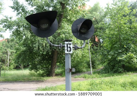 Traffic lights. Mini-traffic light for the children's railway of the USSR times in the recreation park.