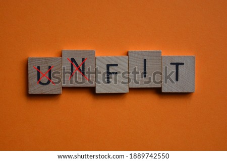 Unfit with prefix Un crossed out leaving word with the opposite meaning, Fit Royalty-Free Stock Photo #1889742550