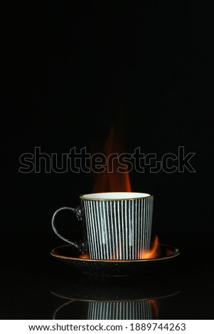 Striped Coffee cup with flames of fire