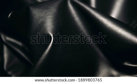 Geometric shape from natural leather, background from leather fabric, texture of their textile. Dark brown leather background.