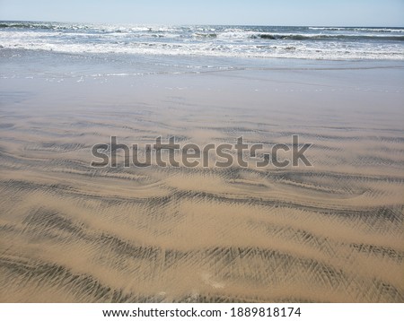 Pictures of the ocean and sand