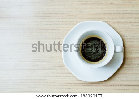 Coffee cup on table top view