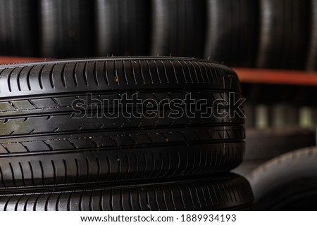 Car tires rack showing for sell or fix in the shop garage business