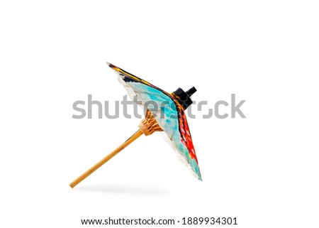 paper umbrella with wood handle isolated on white background