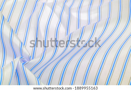 Thick white silk fabric, blue and gray stripes, narrow stripe. line, stroke. Texture background. Template
