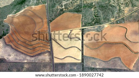 natural textures, United States, abstract photography of relief drawings in fields in the U.S.A. from the air, Genre: abstract expressionism, abstract expressionist photography,