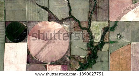 the crack,   United States, abstract photography of relief drawings in  fields in the U.S.A. from the air, Genre: Abstract Naturalism, from the abstract to the figurative,  