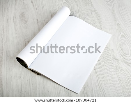 Open magazine with blank pages Royalty-Free Stock Photo #189004721