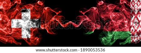 Switzerland, Swiss vs Belarus, Belarusian smoky mystic flags placed side by side. Thick colored silky abstract smoke flags.