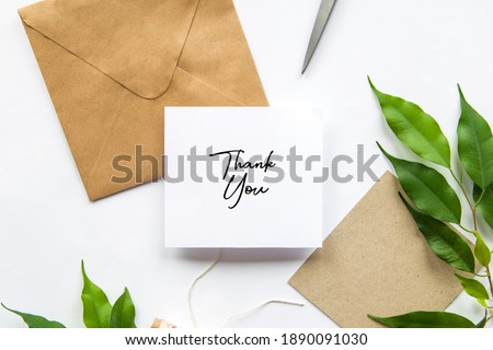 Envelope with text Thank You. Letter, postcard, invitation, congratulation, thanks Royalty-Free Stock Photo #1890091030