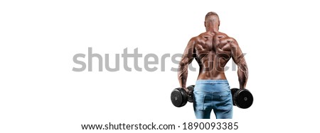 The athlete performs an exercise with dumbbells on a white background. Back view. Shrugs. Fitness, bodybuilding, powerlifting concept. Mixed media Royalty-Free Stock Photo #1890093385