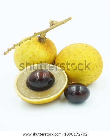 fresh longan fruit and slices isolated on white background.