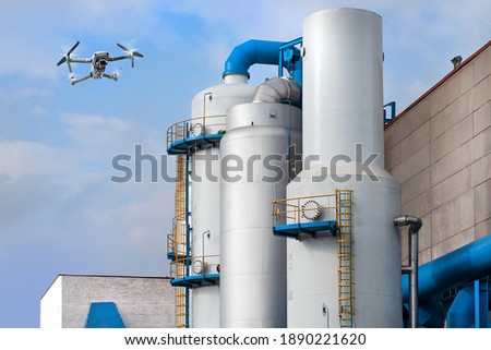 Air-separating factory for producing industrial gases, blue pipes and drone monitoring