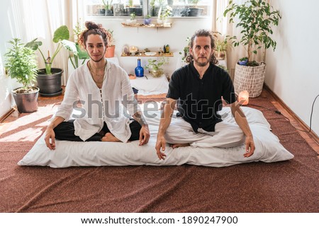 Stock photo of natural therapists looking at camera and smiling.