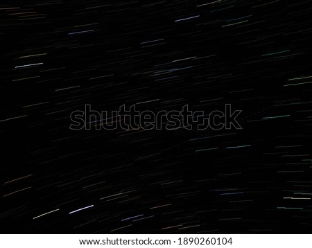 falling stars and satellites at night