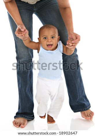 Baby's First Step Holding Mommy Hands