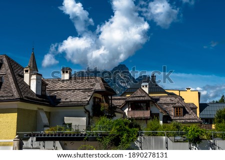 Traditional Houses With Mountain In Bad Aussee in The Alps Of Austria