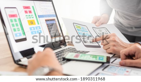 Designers drawing website ux app development. User experience concept. Royalty-Free Stock Photo #1890311968