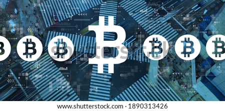 Bitcoin theme with busy city traffic intersection