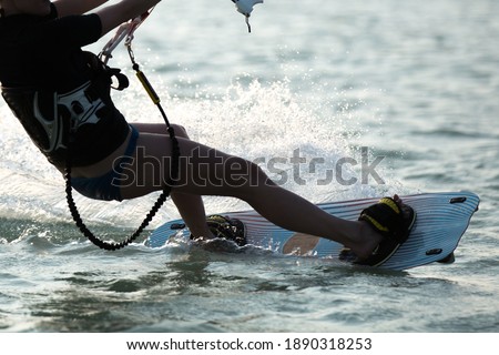 Kitesurfing, Kiteboarding on a exotic island themed action photos.