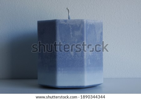 Closeup of a blue geometric candle 