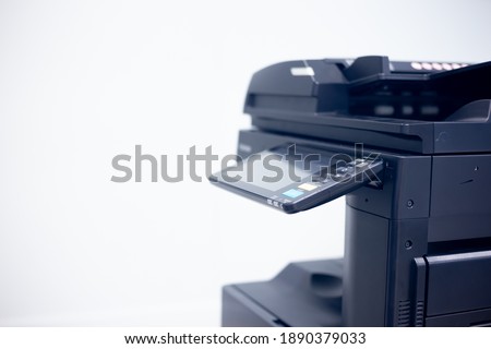 Close-up photocopier or printer is office worker tool equipment for scanning and copy paper.