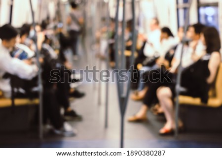 Blur Image of People traveling to work using the BTS (Bangkok Transit System) in the morning, Bangkok. Thailand Thai transportation system. vintage tone colour