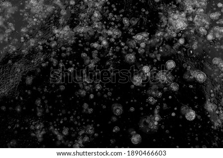 Texture pattern background white Winter, river ice air bubbles stagnant. drawing on ice frost formed. Severe cold frozen water. a large natural stream of water flowing in a channel to the sea, a lake