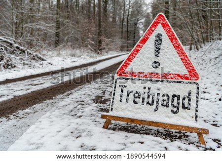 Warning sign with the reference to a driven hunt with the inscription Treibjagd, Germany